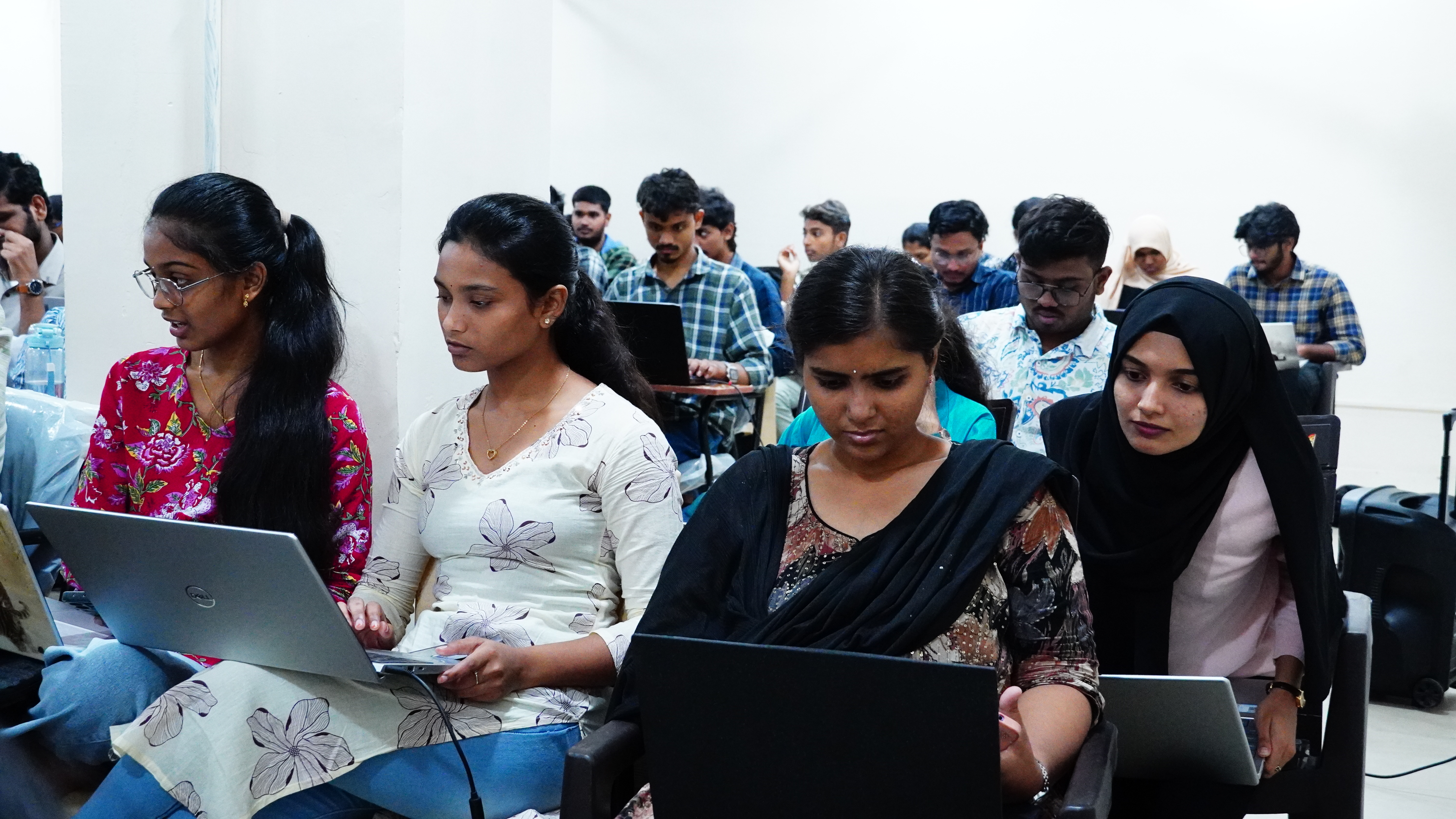 Full classroom cohort coding on laptops during Intensive Bootcamp at Codegnan